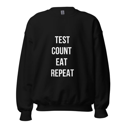 zwarte unisex trui 'test count eat repeat'