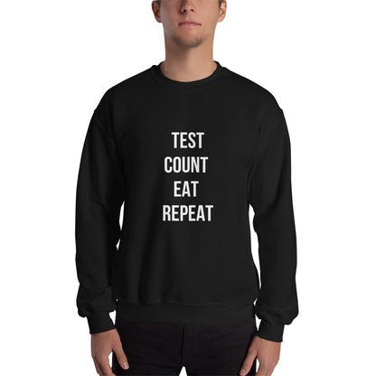 zwarte unisex trui 'test count eat repeat'